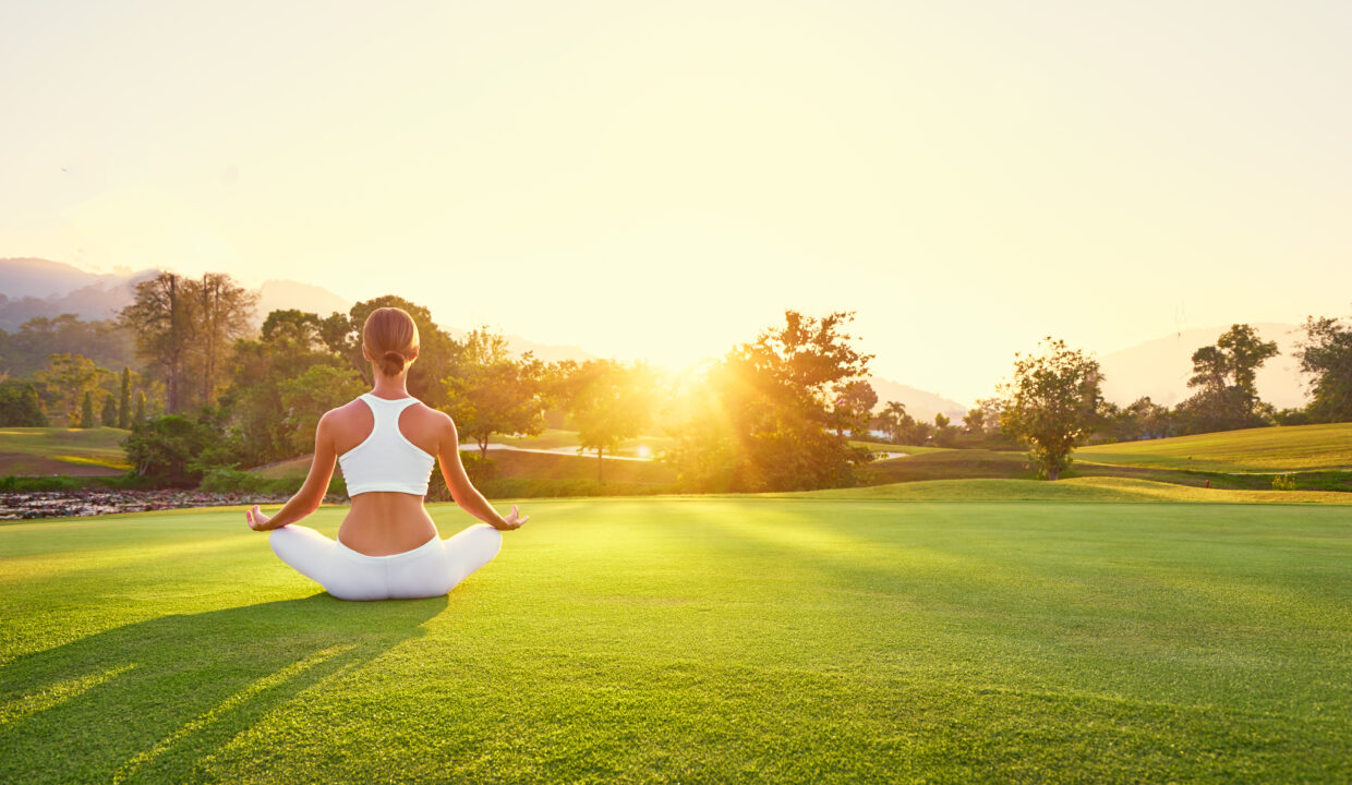 Yoga,At,Park,With,View,Of,The,Mountains,,With,Sunlight.